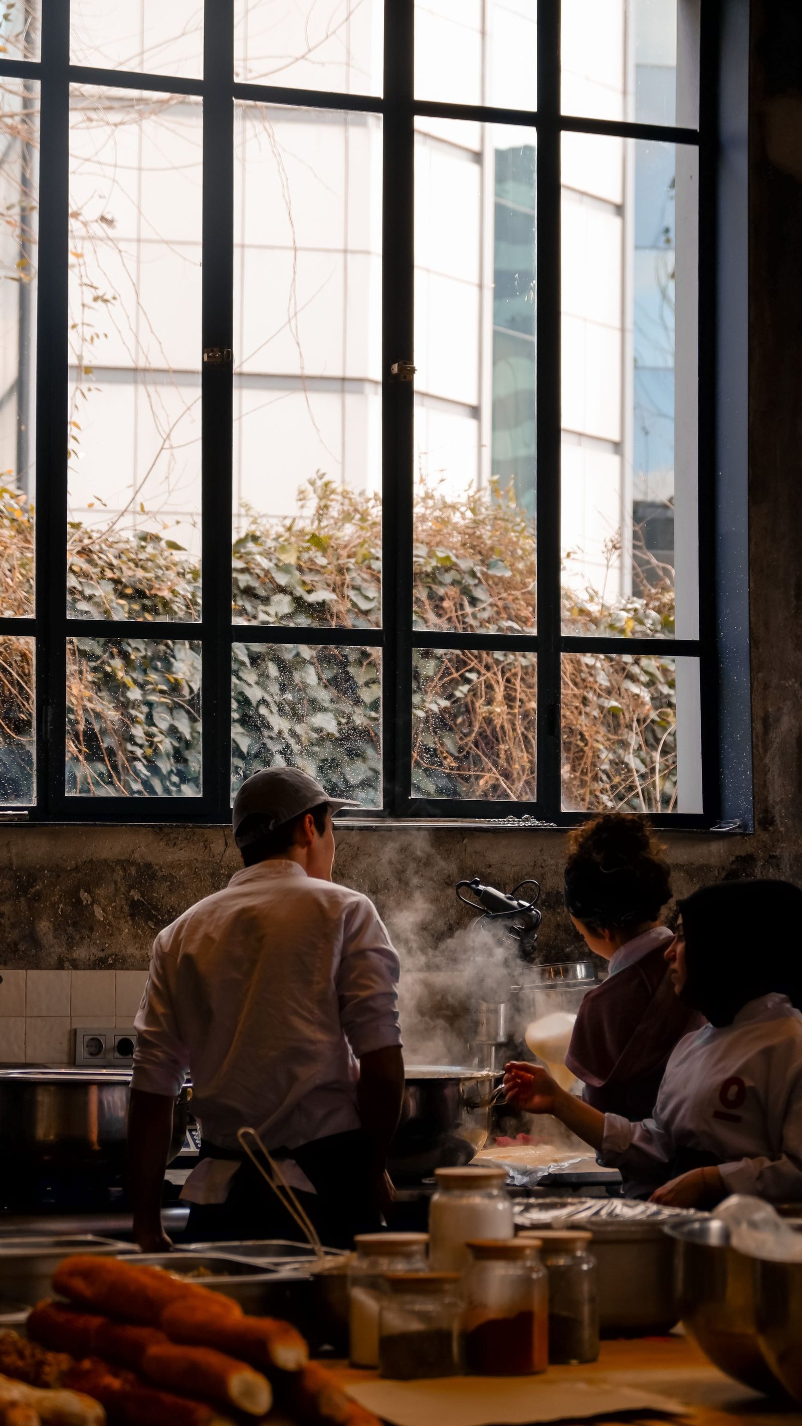 Professional chefs working together in a restaurant kitchen